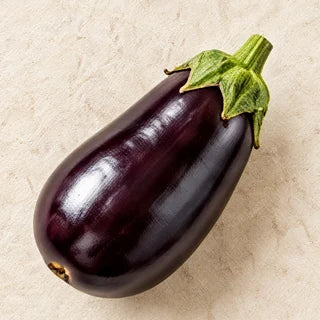 A glossy purple eggplant